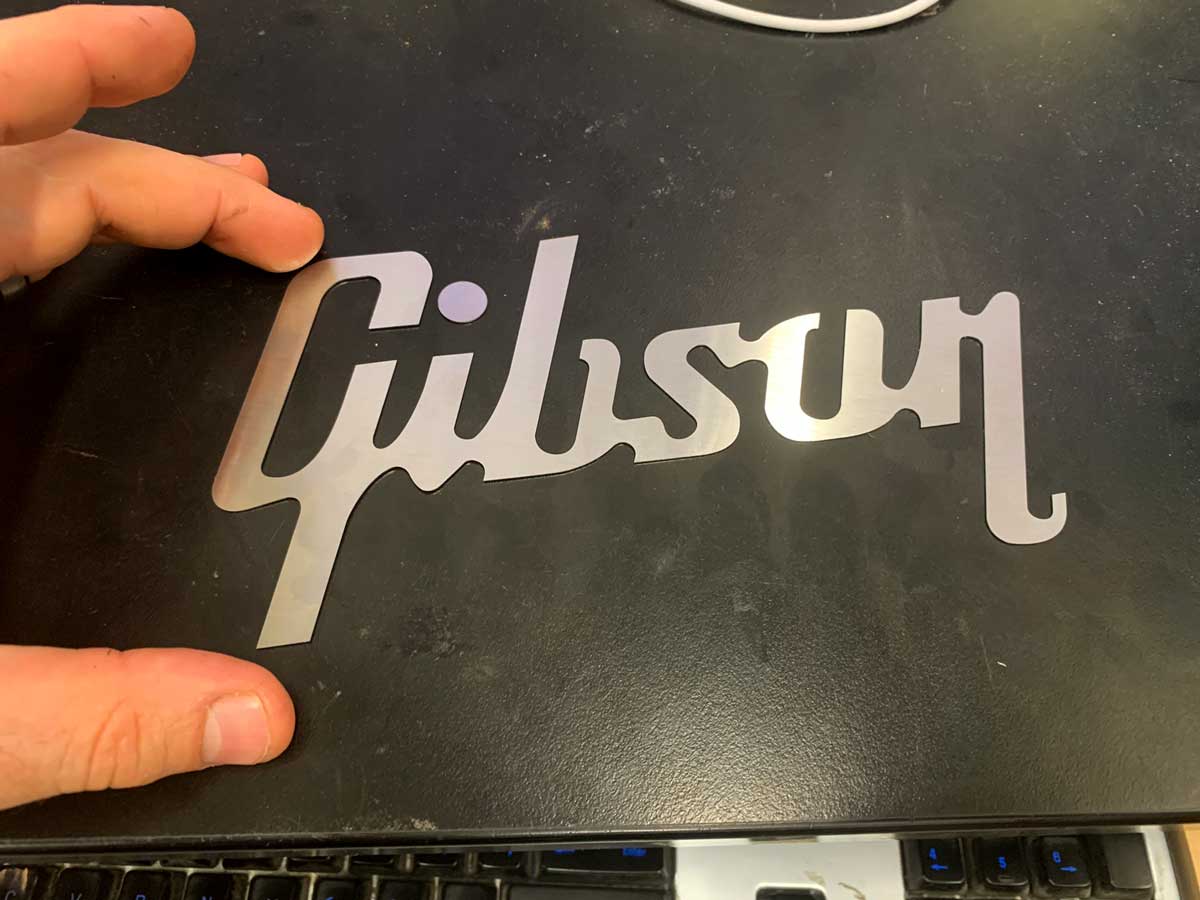 Stainless steel laser-cut logo