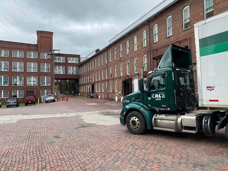 Freight truck loading at the Gravity Ignite dock