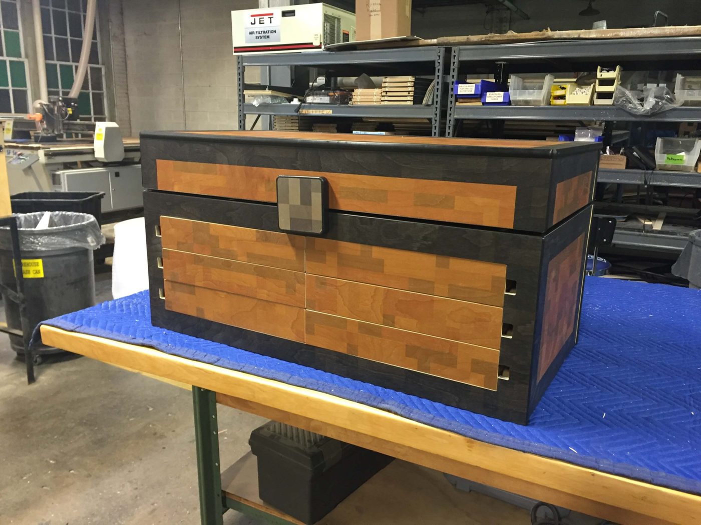 Custom pixel-art wooden collector chest with drawers